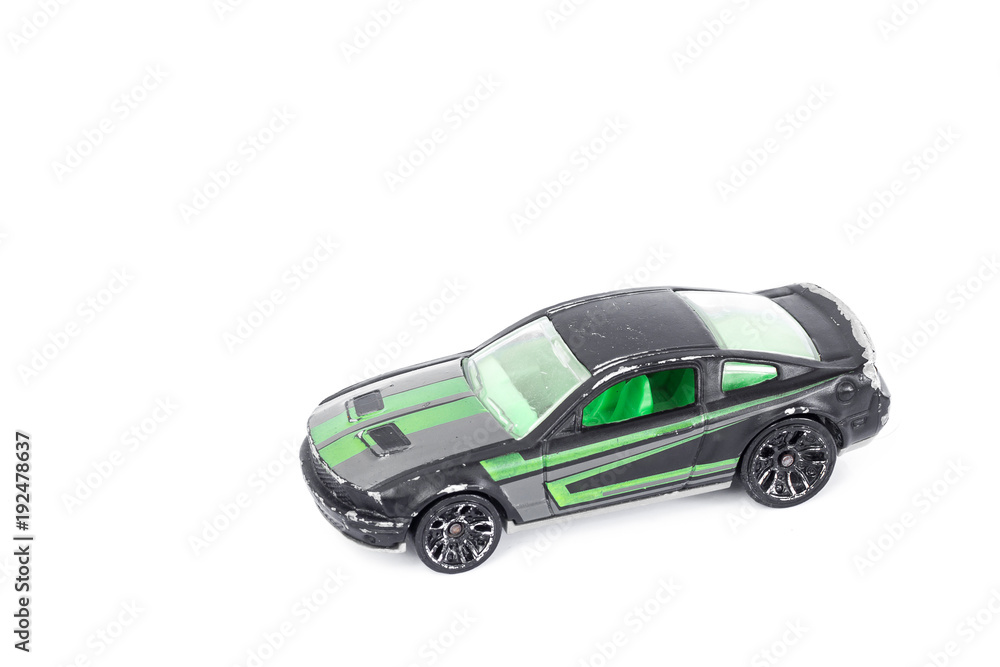 Black toy car isolated on white background. Black toy car isolated on white background.