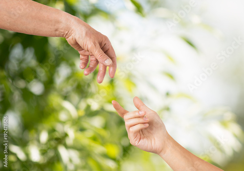close up of senior and young woman hands © Syda Productions