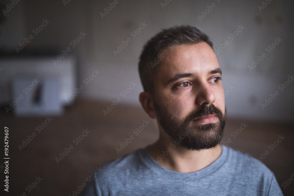 Fototapeta premium Portrait of a man at home or in office.