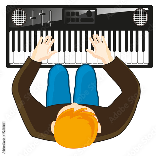 Musician plays on synthesizer