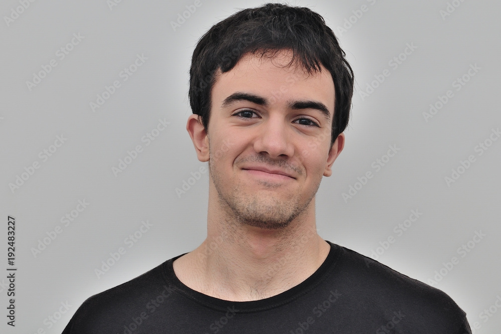 portrait of a joyful young man on a white background portrait of a joyful young man on a white background