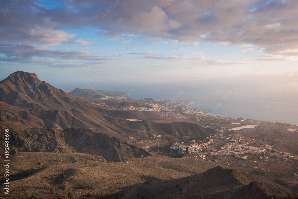 Tenerife mountain landscape. Adeje and Las Americas coastline in the background.