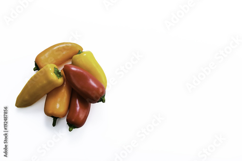 sweet peppers on white negative space