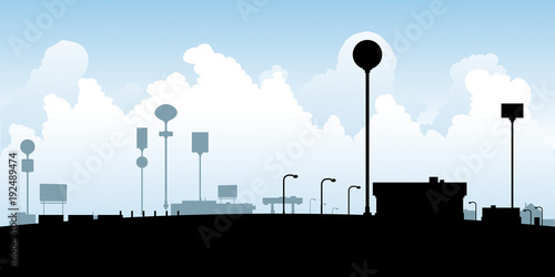 A silhouette illustration of a roadside pitstop of gas stations and fast food restaurants.