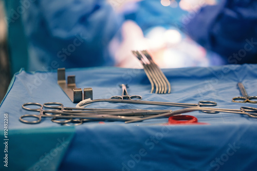 Tableau sur toile Surgical nurse pick up sterile instrument in the surgery operation room in hospital processing technician and surgical instrument technician, surgical technician operating room technician nurse