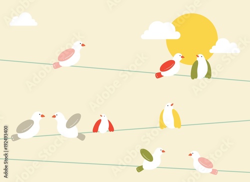 bright colorful birds sitting  on telephone lines