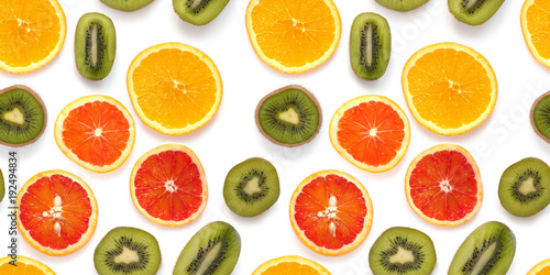 Seamless pattern of fresh fruits: red oranges, kiwi, isolated on white background, top view, flat lay. Food texture background. Healthy food, detox, diet.