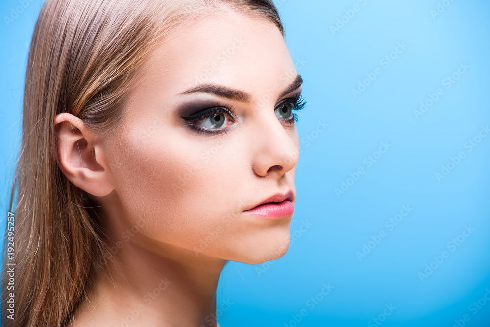 Fototapeta premium Close-up of a young girl face with creative visage face art