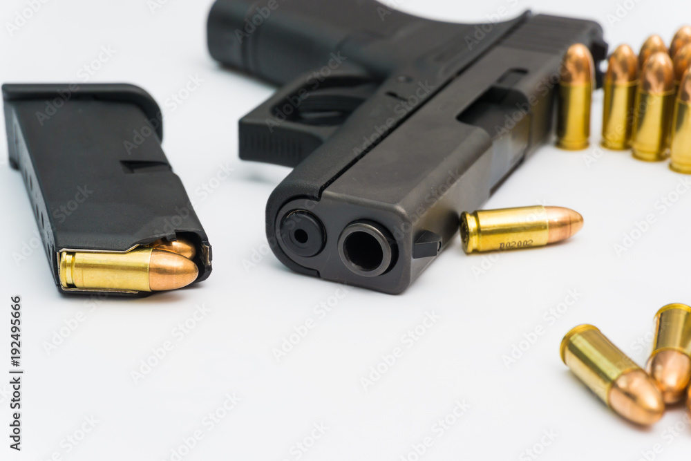 9mm bullet with semi automatic gun isolated on white 9mm bullet with semi automatic gun isolated on white