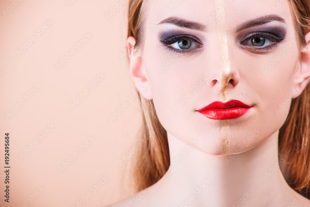 Close-up of a young girl face with creative visage face art Close-up of a young girl face with creative visage face art