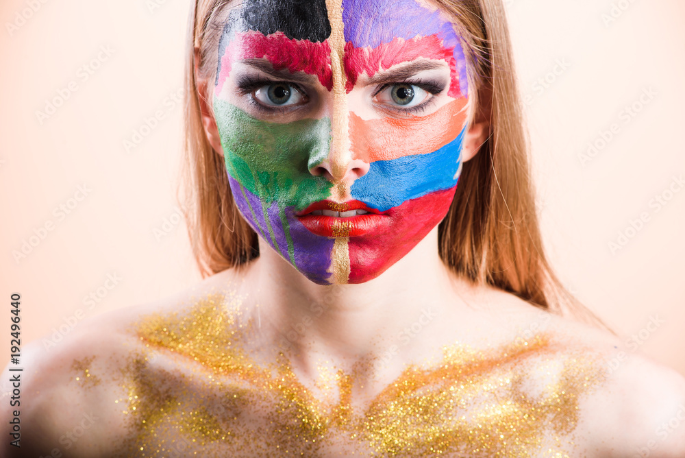 Close-up of a young girl face with creative visage face art Close-up of a young girl face with creative visage face art