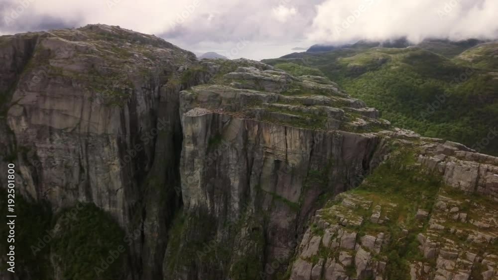 Aerial view from drone on breathtaking lysefjord during the rain. Cloudy sky. 4k footage, drone view. Preikestolen, Norway. Aerial view from drone on breathtaking lysefjord during the rain. Cloudy sky. 4k footage, drone view. Preikestolen, Norway.