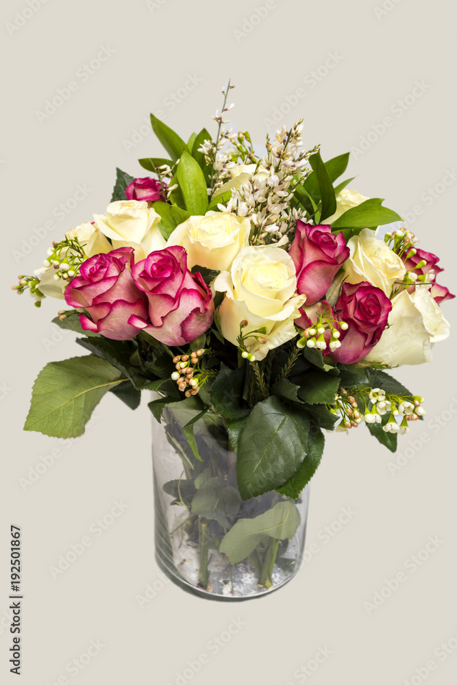 Flower arrangement of white and pink roses