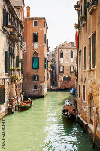 View of one of the many canals of Venice, Italy. Venice is a popular tourist destination of Europe. © LALSSTOCK
