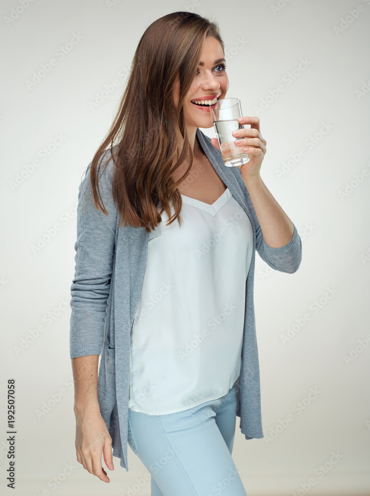 Smiling woman holding water glass. Isolated portrait on white Smiling woman holding water glass. Isolated portrait on white