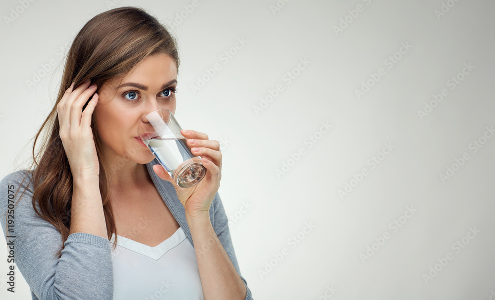 Isolated studio portrait of girl with water glass. Isolated studio portrait of girl with water glass.