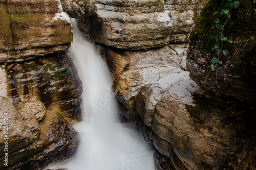 Powerful waterfall flowing down in Georgia. Martvili canyon. Okatse canyon