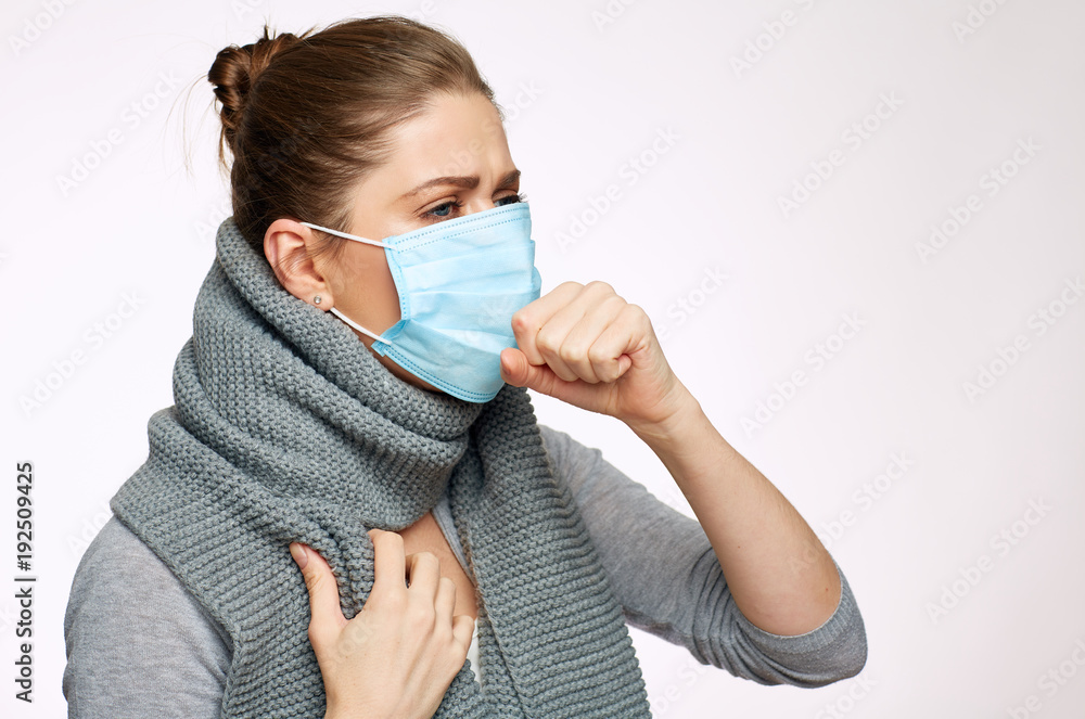 Coughing woman wearing medical mask. Coughing woman wearing medical mask.