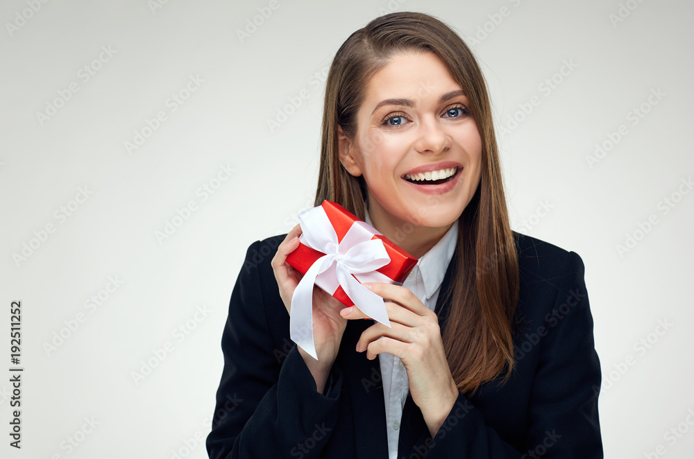 Smiling businesswoman wearing black business suit holding small Smiling businesswoman wearing black business suit holding small