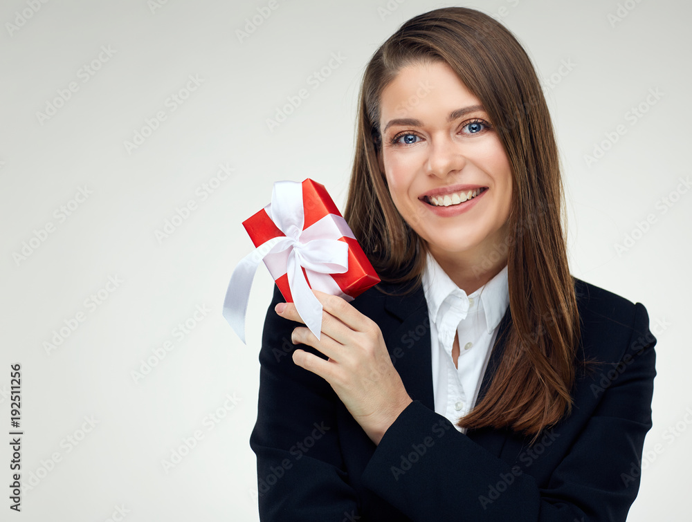 Busonesswoman wearing black suit holding red gift box. Busonesswoman wearing black suit holding red gift box.