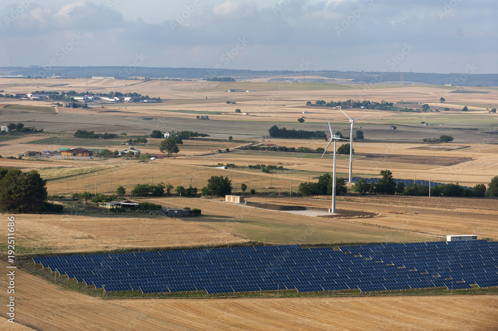 Obraz premium Solar panels and wind turbines