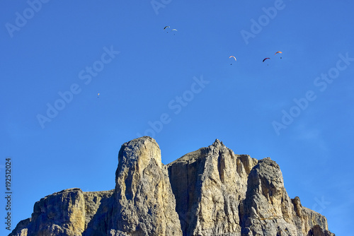 Hang glider in Italian mountains, Italy, Dolomite mountains, around Sella pass