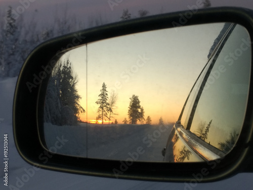 Sunset (sunrise) reflection in the car mirror © Maxim