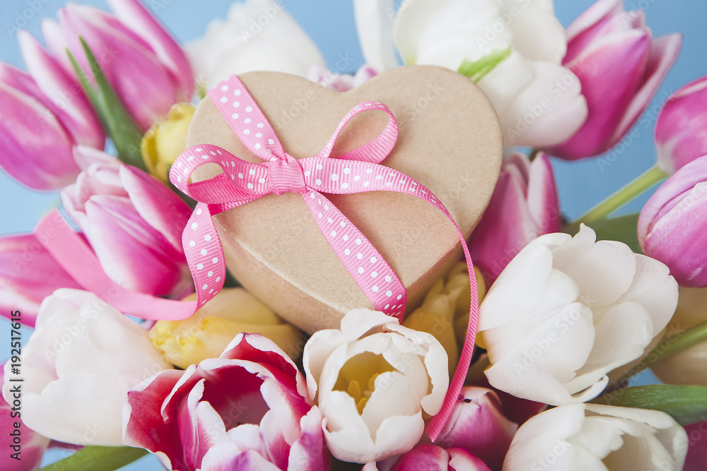 Heart-shaped gift and fresh Tulips