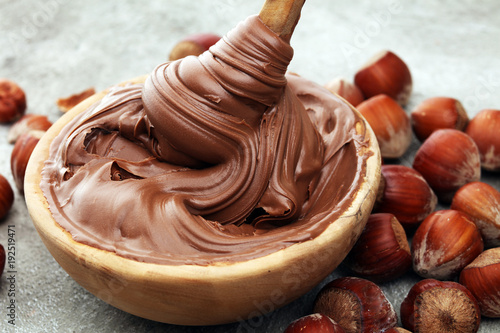 Photography Homemade hazelnut spread in wooden bowl. Hazelnut Nougat cream