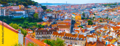 Summertime sunshine day cityscape panoramic view of town and all historic old centre in Lisbon, Portugal.