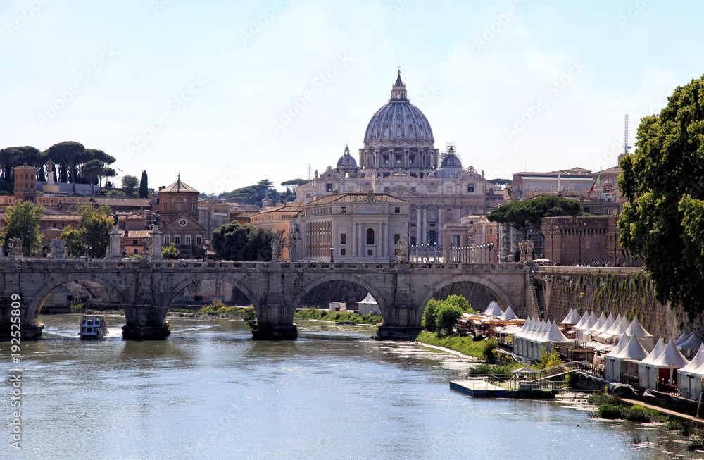 Saint Peter's basilica and Saint Angelo bridge in Rome, Italy
