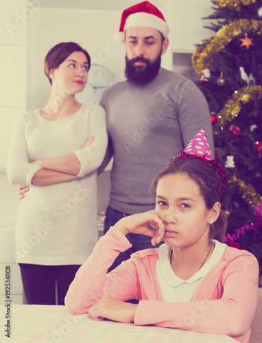 Parents lecturing daughter at Christmas