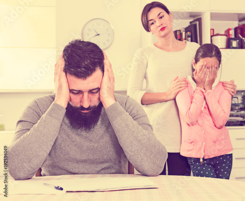 Εκτύπωση καμβά Young family having difficulties with paying utility bills and rent