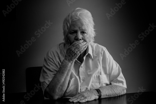 Elderly woman distressed, upset and sad