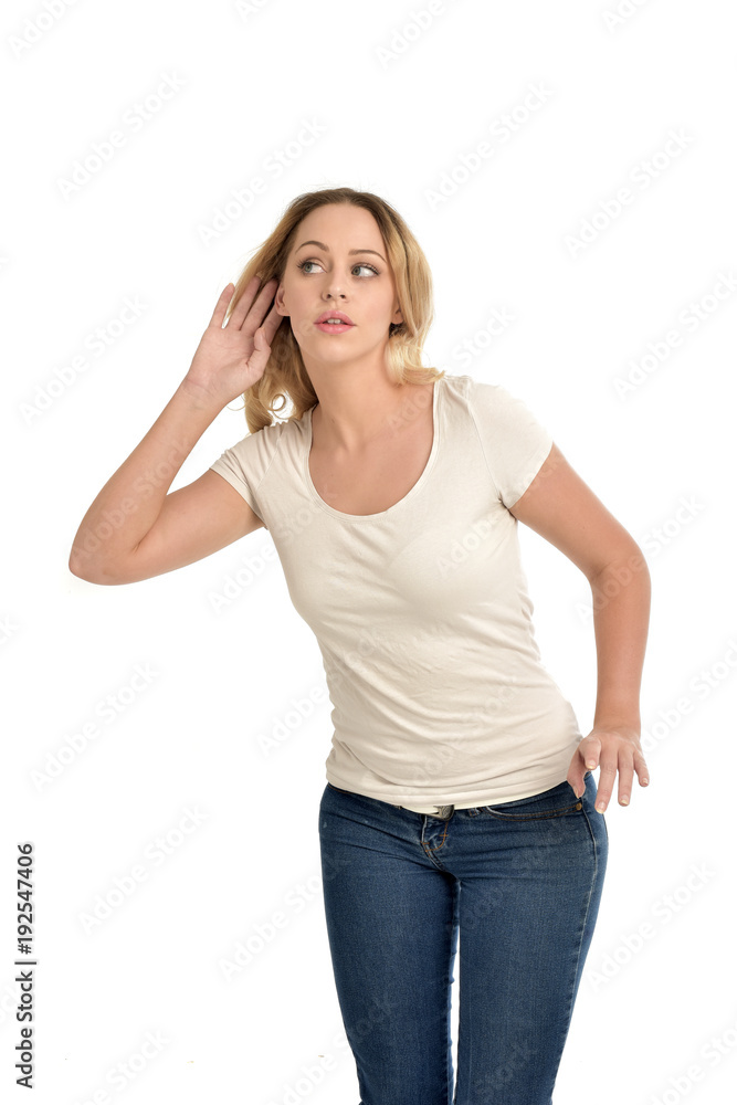 3/4 portrait of blonde girl wearing white shirt, isolated on white background. 3/4 portrait of blonde girl wearing white shirt, isolated on white background.