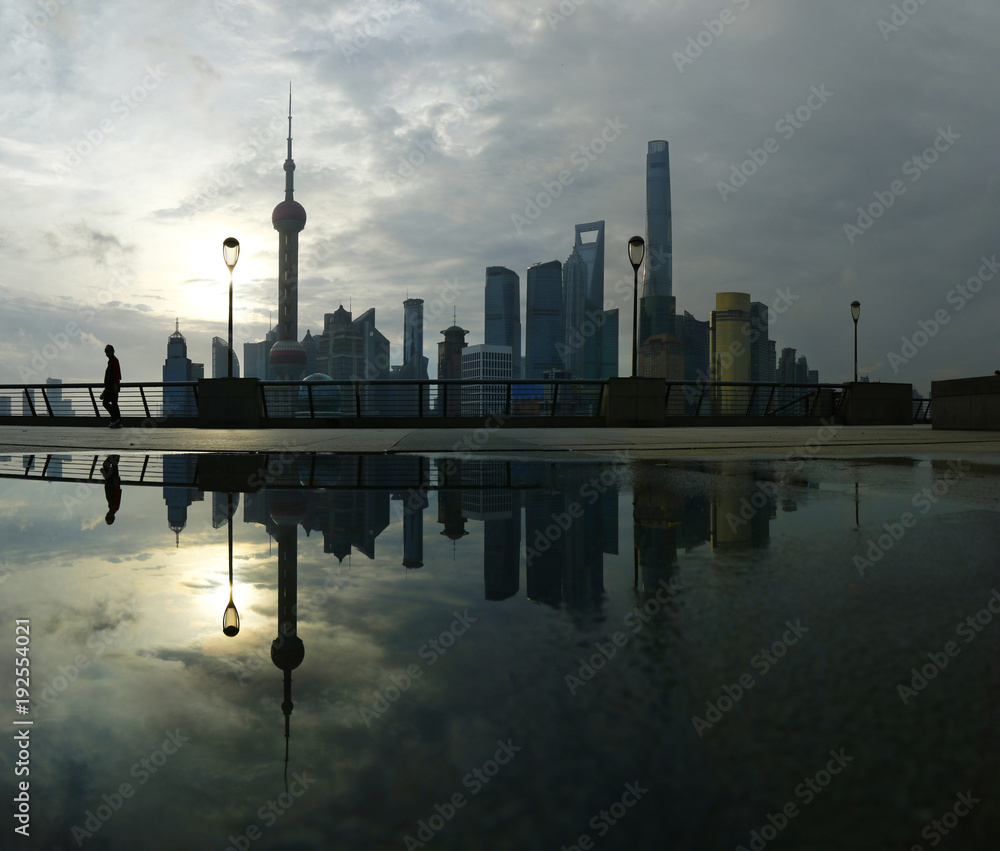 Fototapeta premium view of building of Pudong in Shanghai, China, with refection on water 
