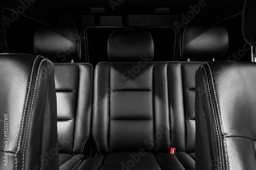 Leather seats in prestige luxury car. Interior detail.