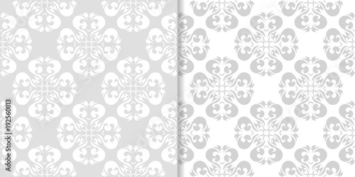 Light gray floral ornaments. Set of seamless patterns