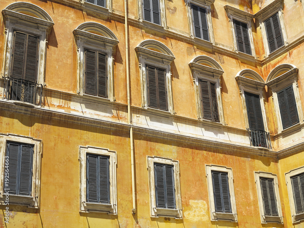 Obraz premium Facade of a classical building in the historical center of Rome, Italy