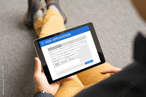 Fotografie Man applying for visa online