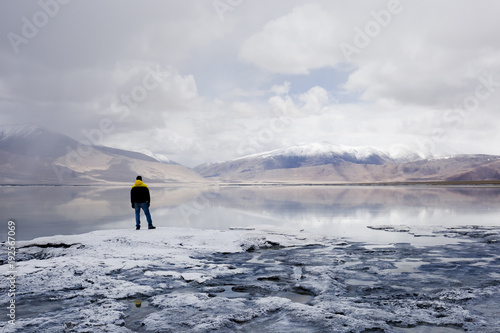 Man standing alone near Mountain and River - Ladakh