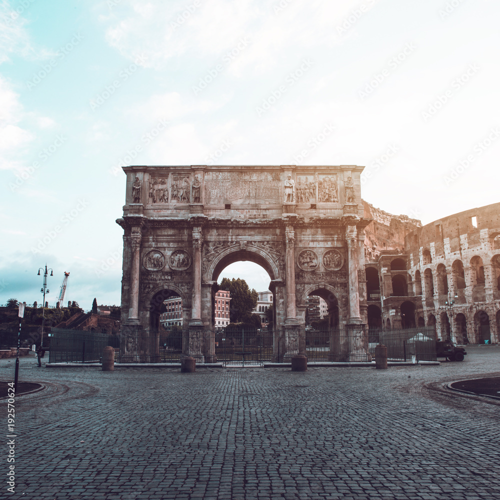 The Arch of Titus alongside the Colosseum, Rome