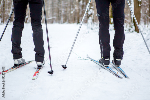 Photo of legs of two skiers