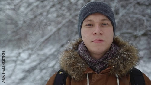 Portrait of a Young Man Looking at the Camera. Winter day.