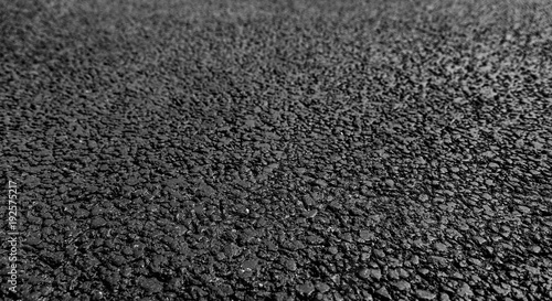 New asphalt, road grainy surface. Soft focus