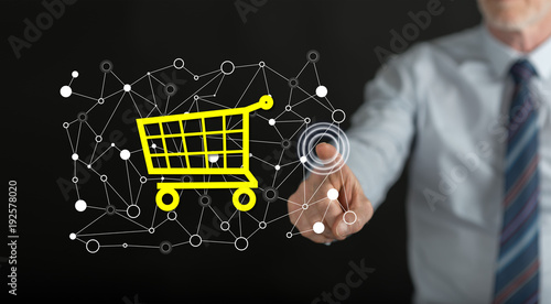 Man touching an e-commerce concept on a touch screen