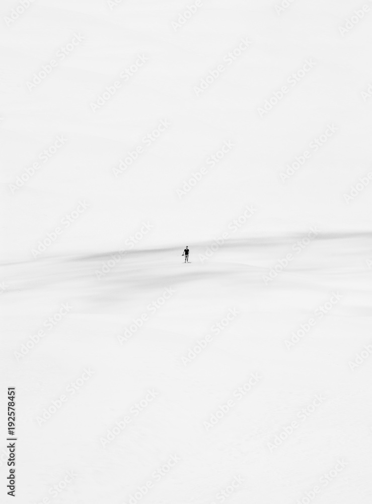 Person standing in sand Person standing in sand