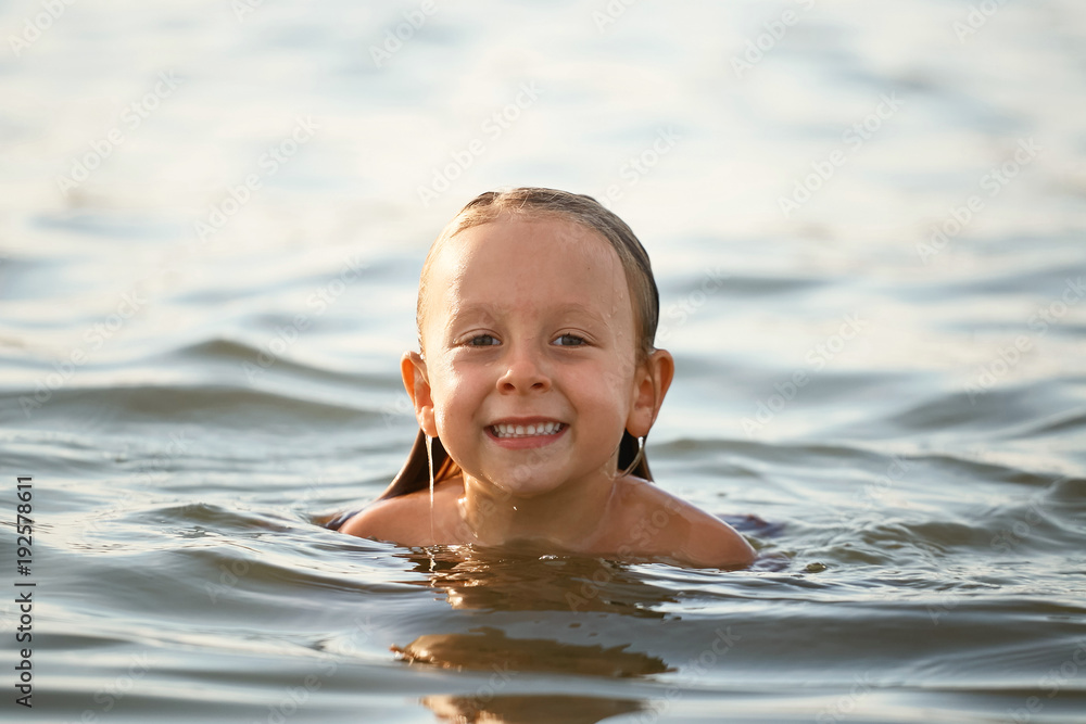 Girl having fun bathing in the sea. Girl having fun bathing in the sea.