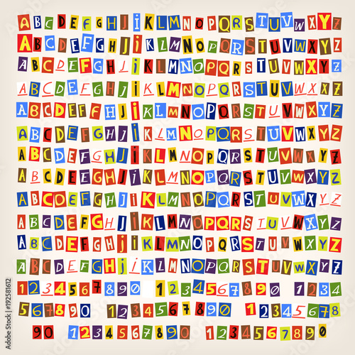 Cutout letters numbers and symbols from newspapers and magazines for creating colorful funny messages.   photo