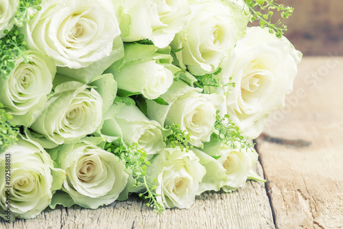 Bouquet of white roses for women s day  gray background  selective focus